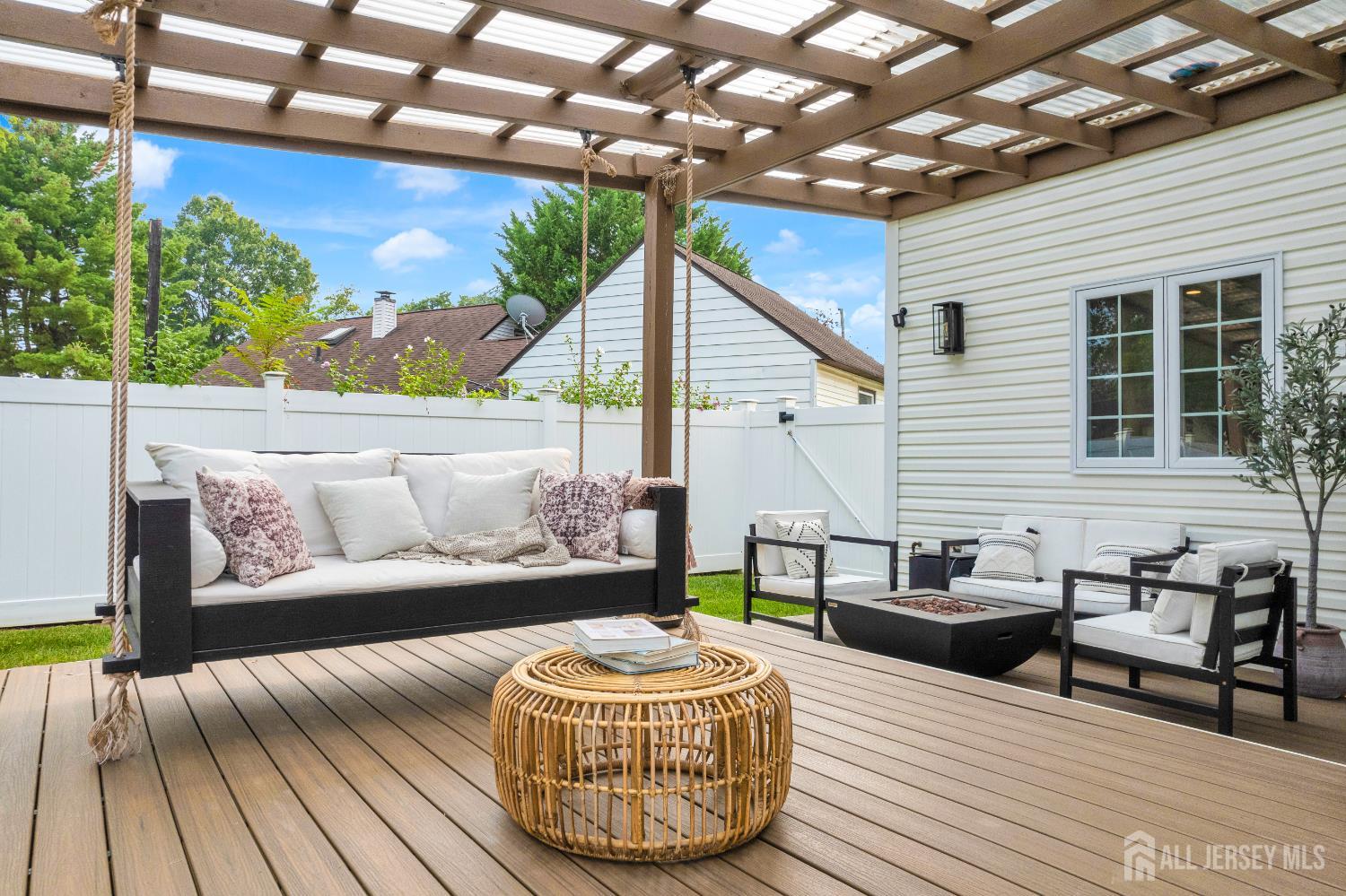 38 Sturgis Road Edison, NJ 08817 - Photo 38 of 41 a outdoor living space with furniture and a potted plant