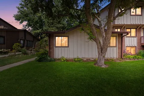 a backyard of a house with lots of green space