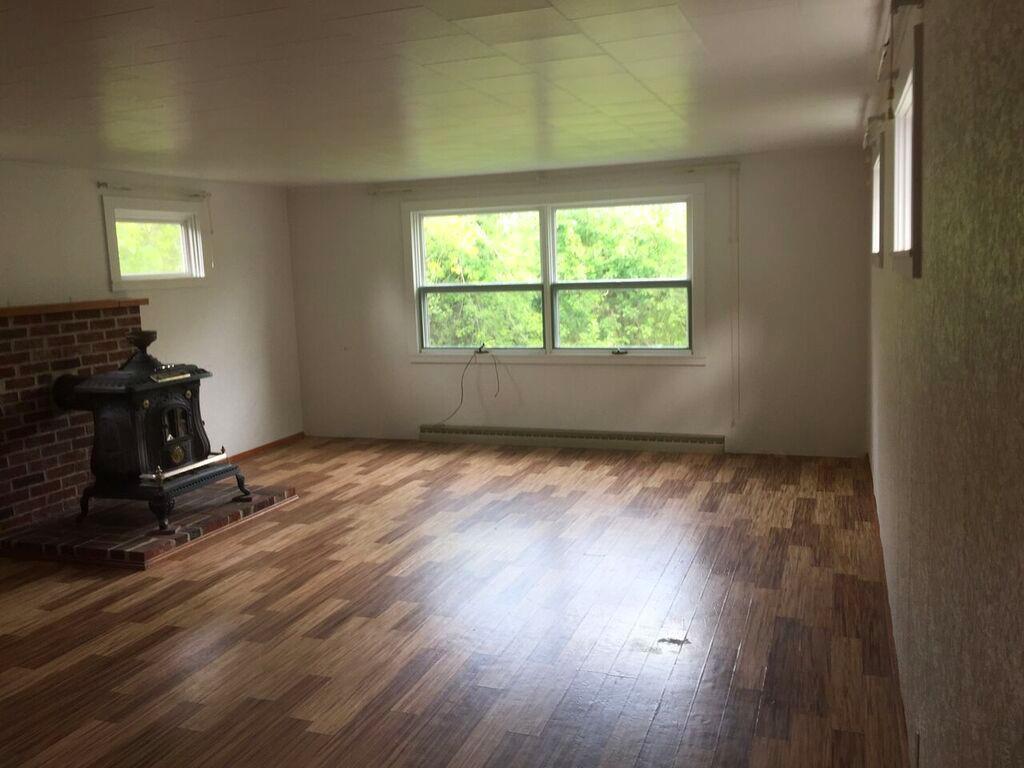 4 Old County Road Orland, ME 04472 - Photo 12 of 26 The living room looks out over the...