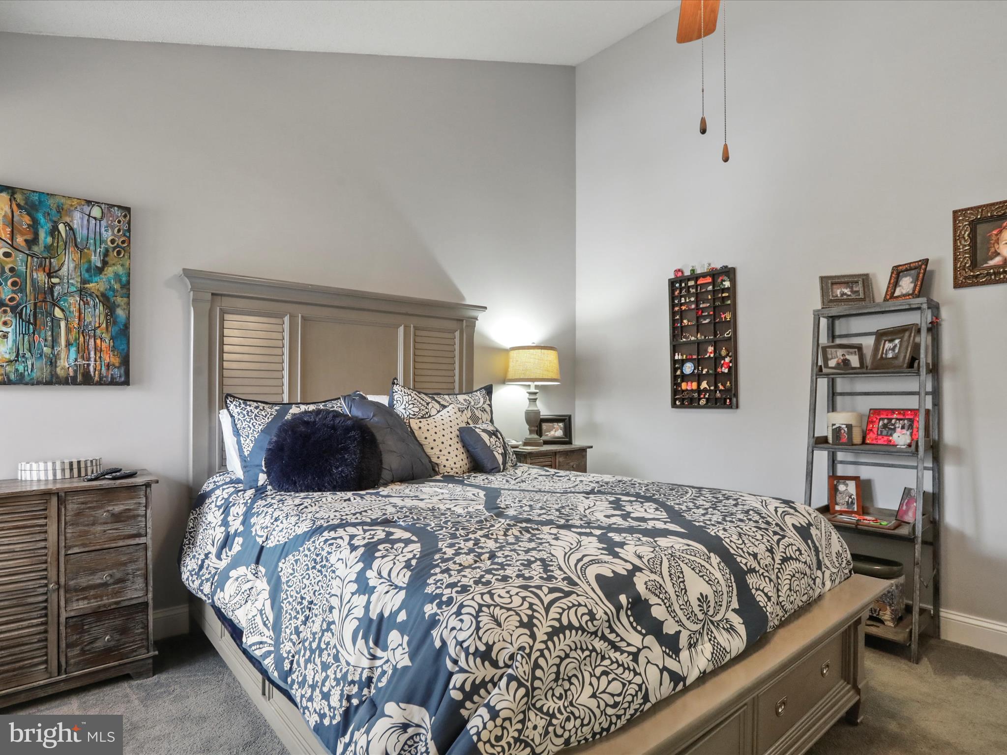 205 Tecumseh Trail Hedgesville, WV 25427 - Photo 19 of 75 a bedroom with a bed and cabinets