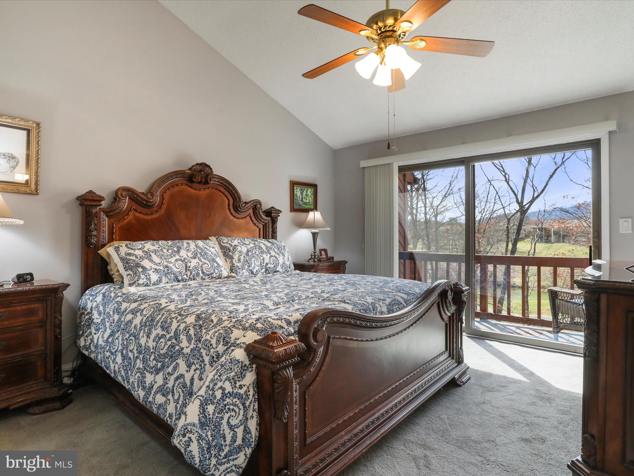 205 Tecumseh Trail Hedgesville, WV 25427 - Photo 25 of 75 a bed sitting in a bedroom next to a window