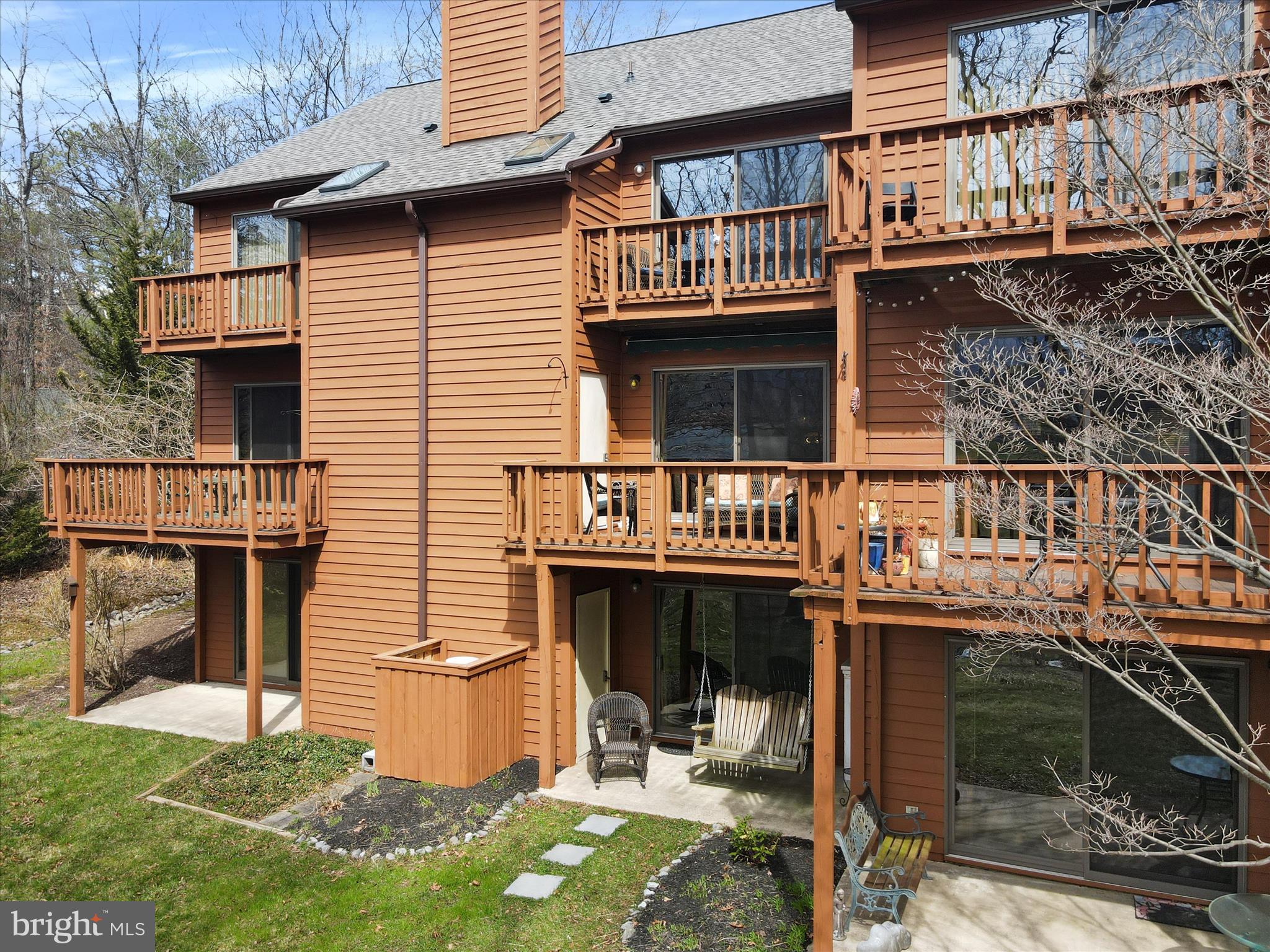 205 Tecumseh Trail Hedgesville, WV 25427 - Photo 47 of 75 a view of a house with backyard and sitting area