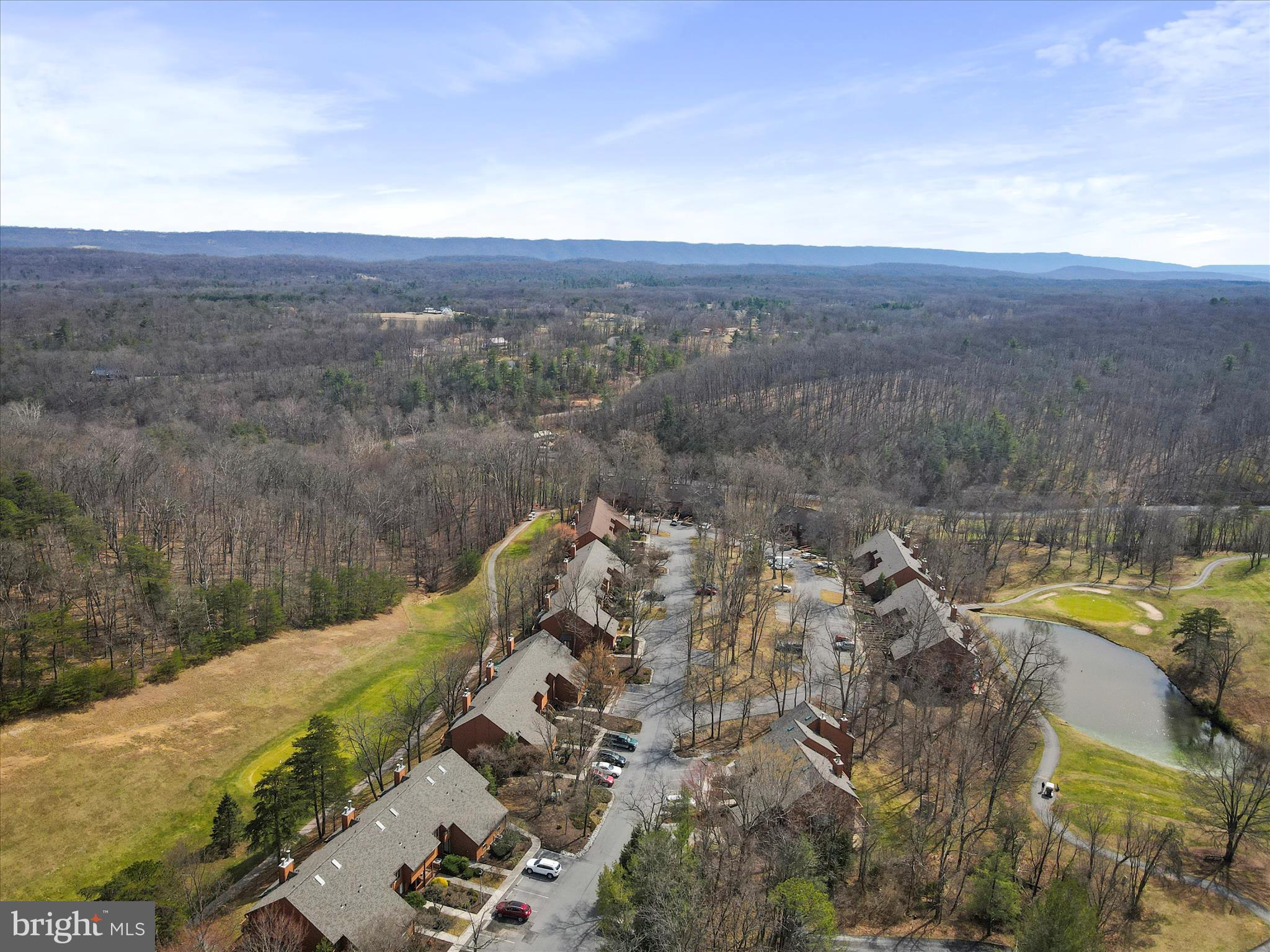 205 Tecumseh Trail Hedgesville, WV 25427 - Photo 52 of 75 a view of a lake with a mountain