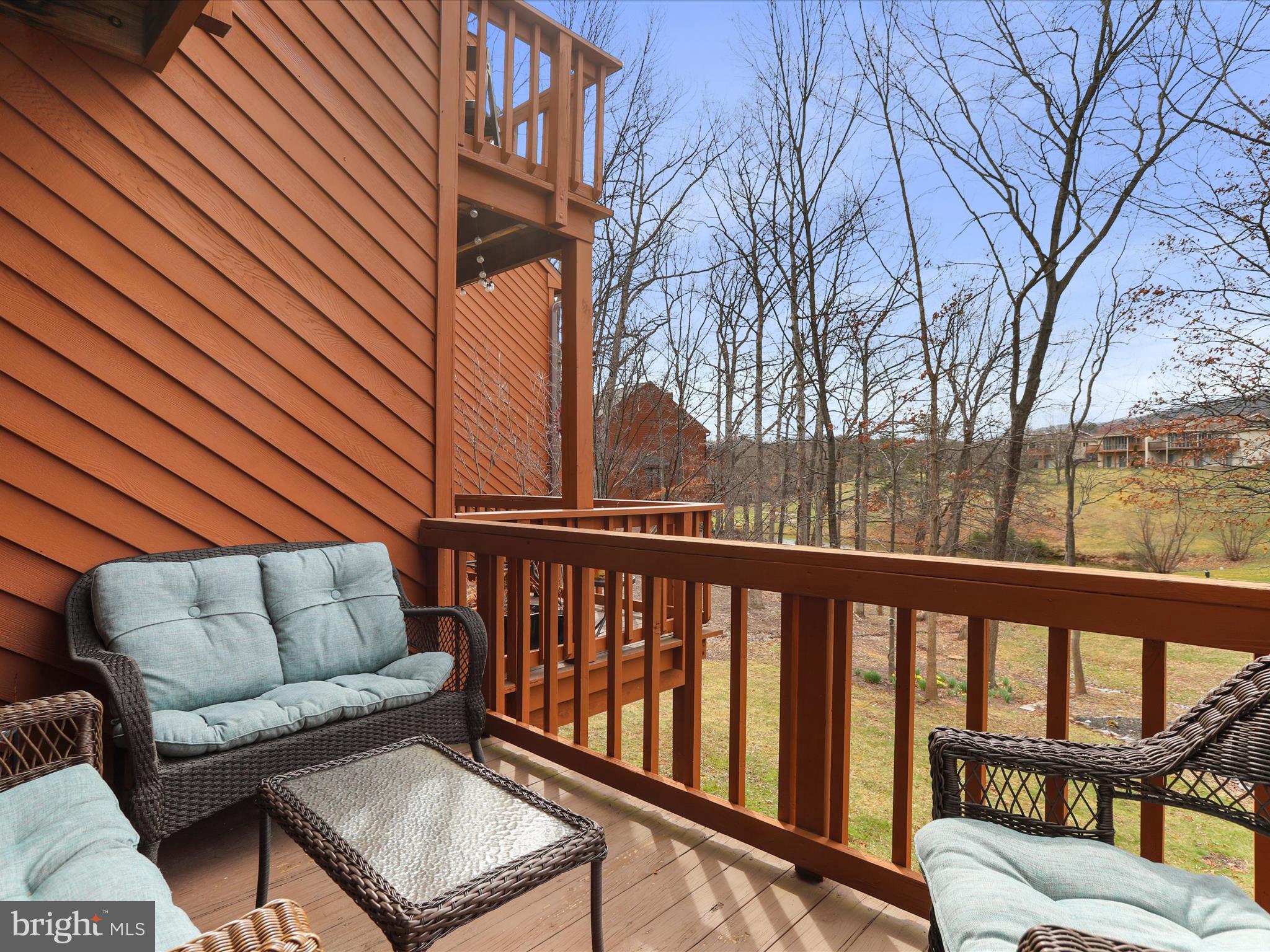205 Tecumseh Trail Hedgesville, WV 25427 - Photo 7 of 75 Balcony off living room with golf course views.