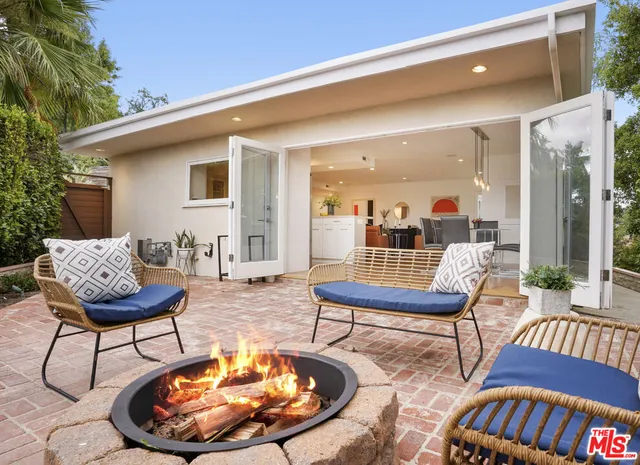 a view of a swimming pool with a lounge chair
