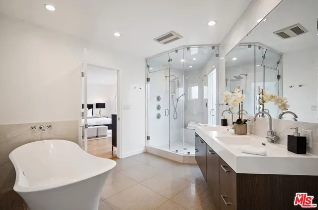 a table and chairs sitting in front of a window