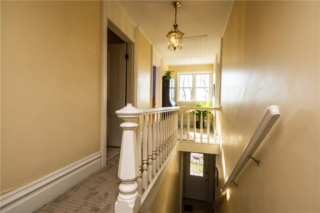 4096 Glasgow Road Valencia, PA 16059 - Photo 14 of 25 Bright and detailed is this staircase along with a sitting area and newer windows too!