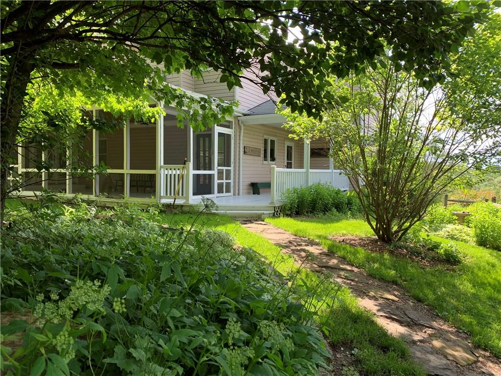 4096 Glasgow Road Valencia, PA 16059 - Photo 6 of 25 Beautiful setting from the screened in porch to the outdoor shower!