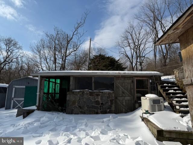 51 Scott Road Glen Mills, PA 19342 - Photo 101 of 103 a view of a patio with table and chairs and potted plants