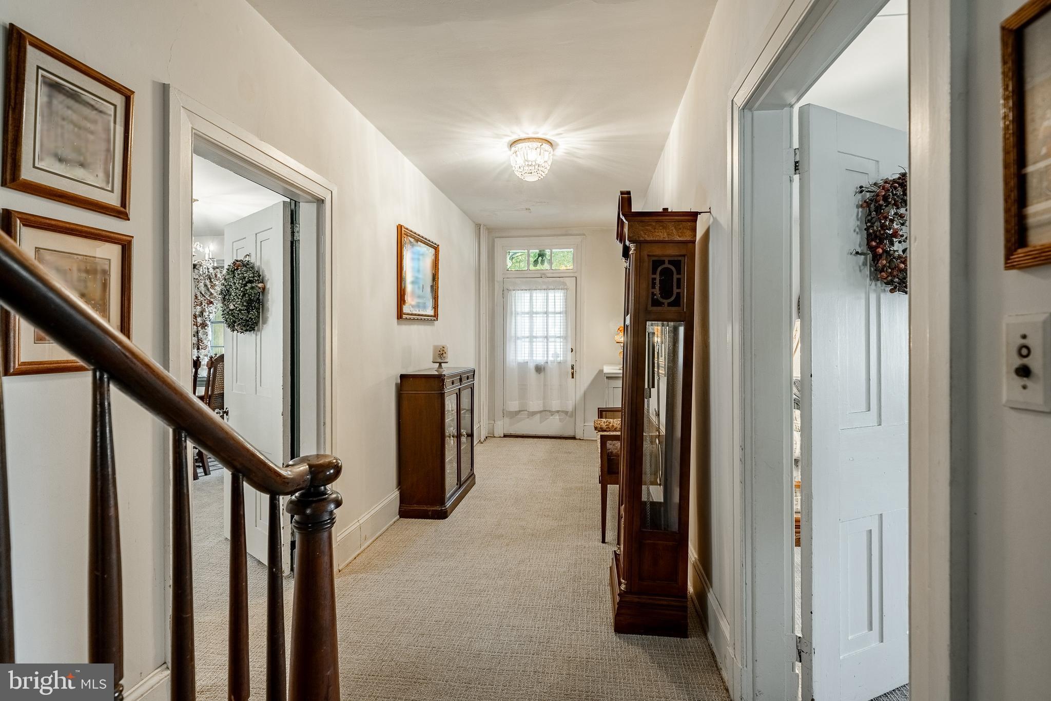 51 Scott Road Glen Mills, PA 19342 - Photo 14 of 85 a view of a hallway with closet and stairs