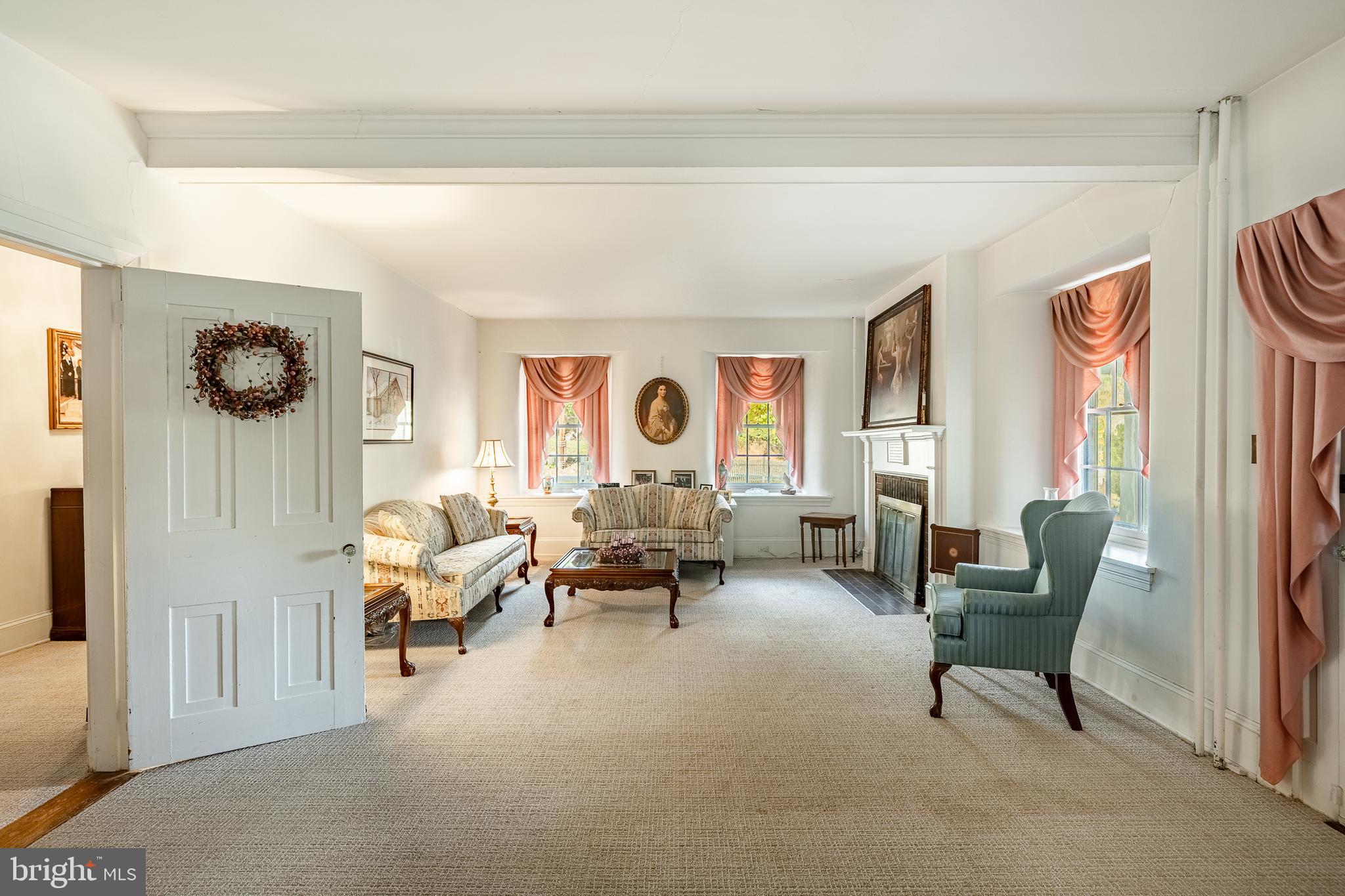 51 Scott Road Glen Mills, PA 19342 - Photo 15 of 85 a living room with furniture and a window
