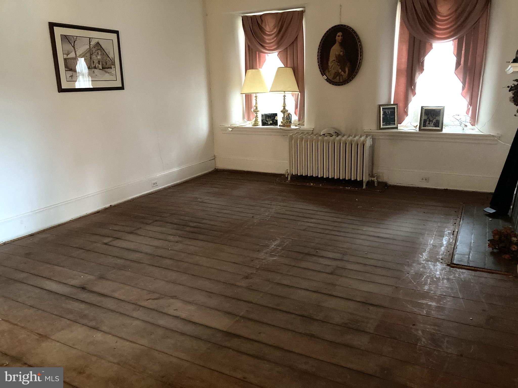51 Scott Road Glen Mills, PA 19342 - Photo 16 of 85 a bathroom with a sink a mirror and window
