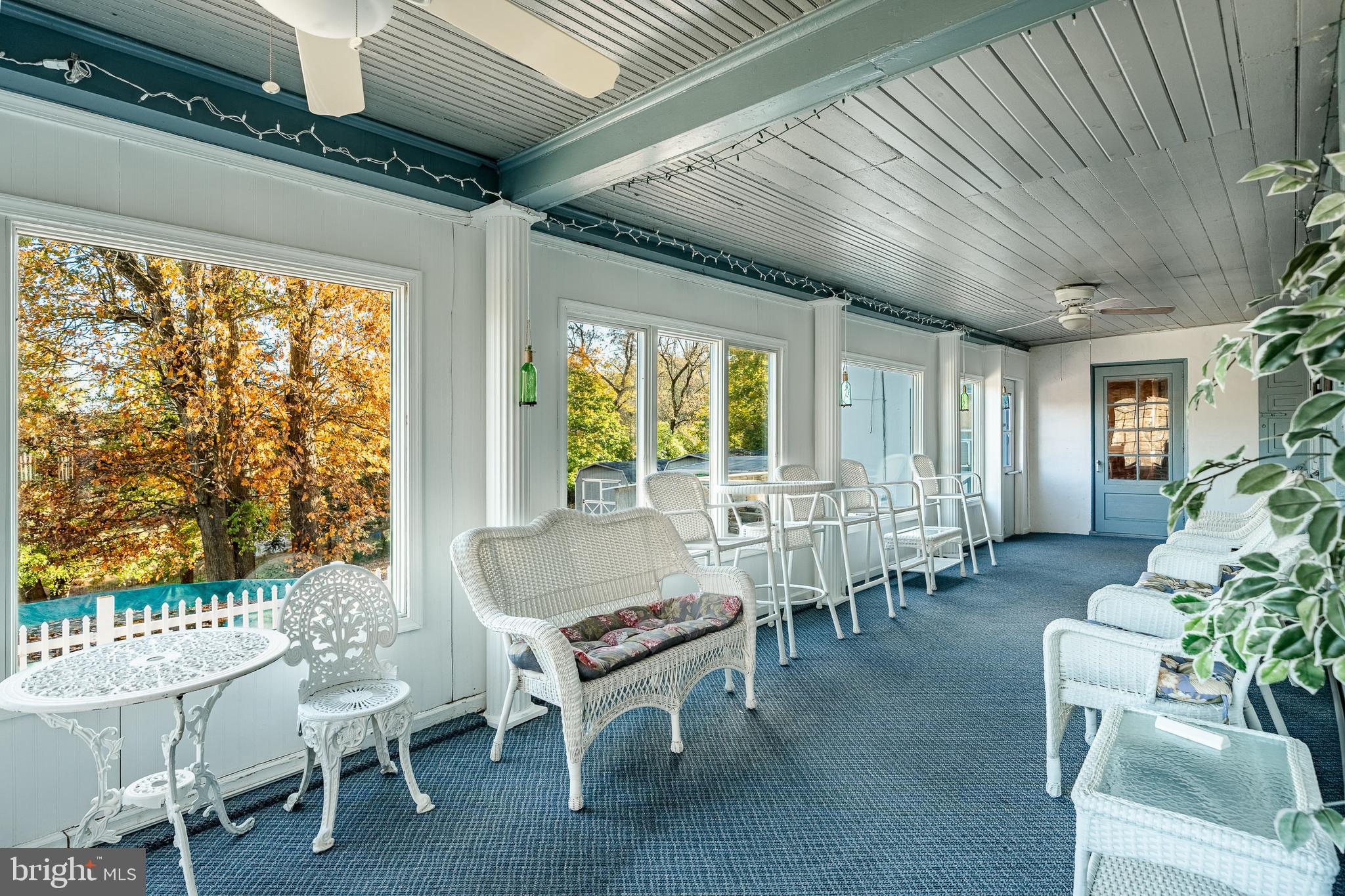 51 Scott Road Glen Mills, PA 19342 - Photo 34 of 85 a living room with furniture and a large window