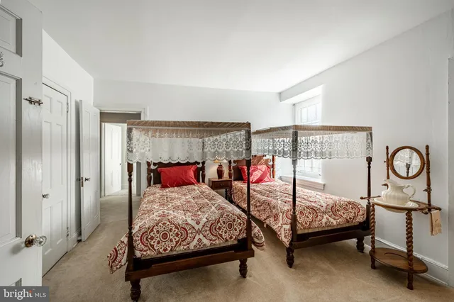 a view of yard with swimming pool and trees