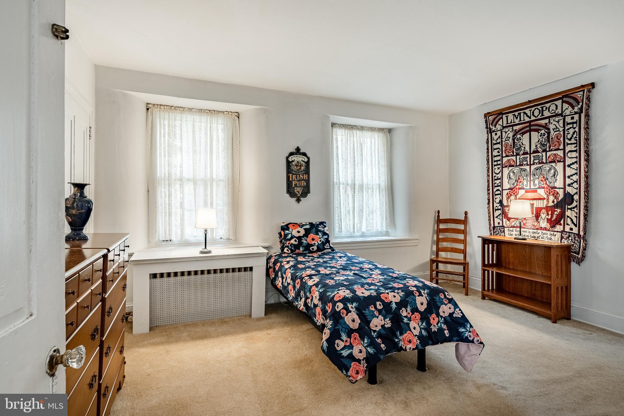 51 Scott Road Glen Mills, PA 19342 - Photo 39 of 85 a bedroom with a bed and a window