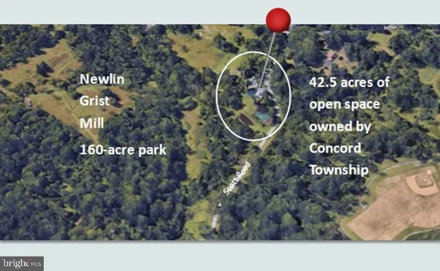 a front view of a house with swimming pool