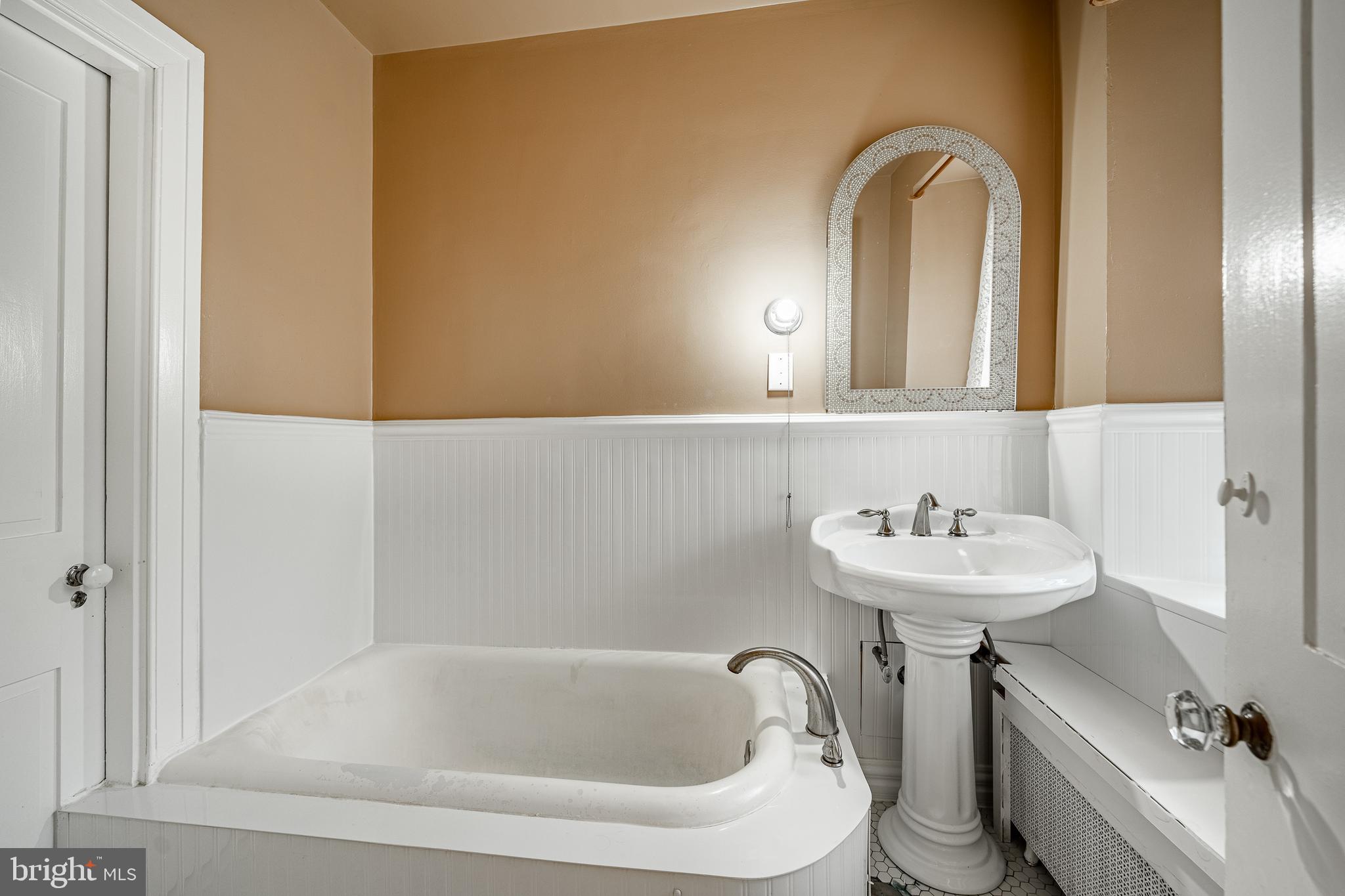 51 Scott Road Glen Mills, PA 19342 - Photo 44 of 85 a bathroom with a sink and a toilet