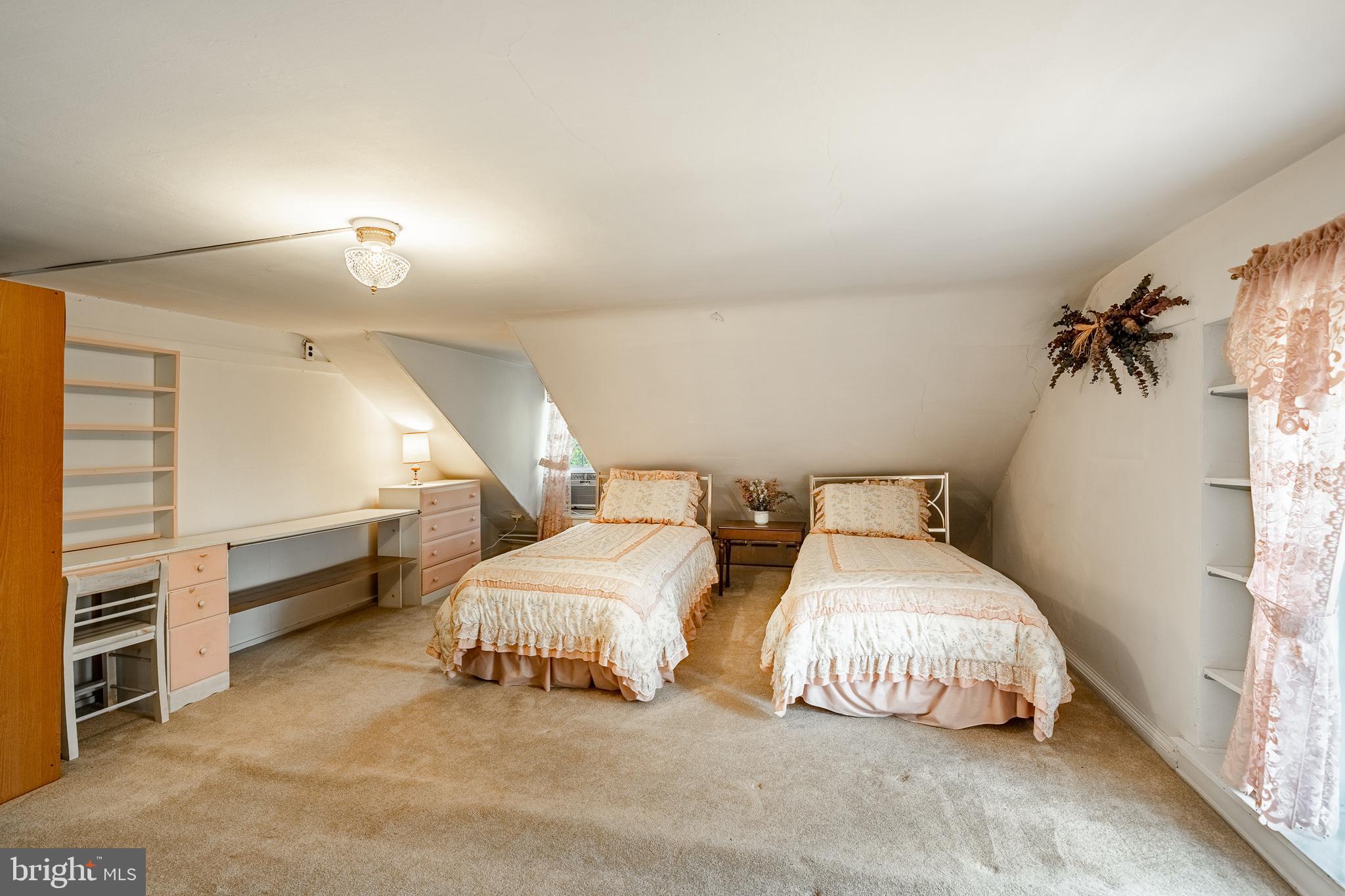 51 Scott Road Glen Mills, PA 19342 - Photo 59 of 85 a spacious bedroom with two bed and a window