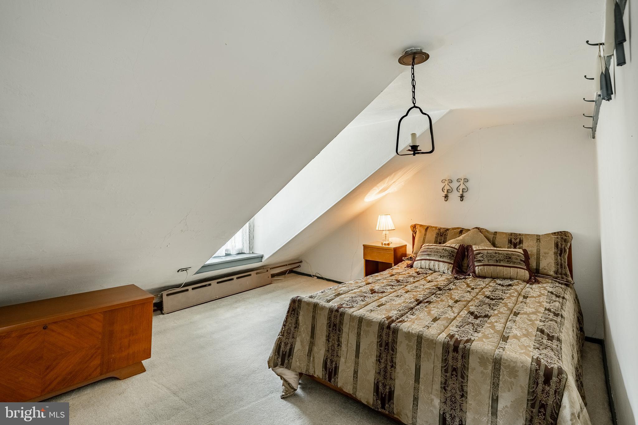 51 Scott Road Glen Mills, PA 19342 - Photo 62 of 85 a bedroom with a bed and a ceiling fan