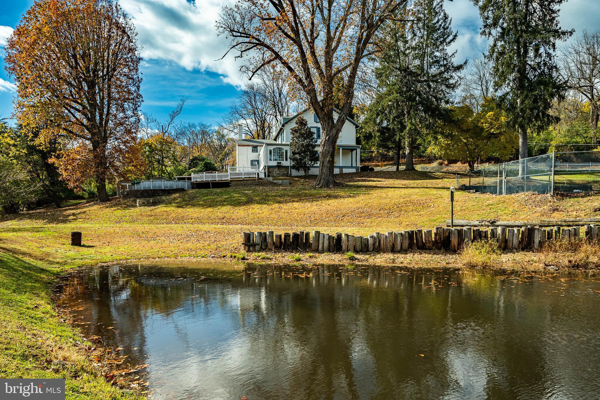 51 Scott Road Glen Mills, PA 19342 - Photo 67 of 85 a view of a lake with trees