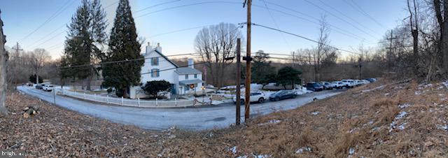 51 Scott Road Glen Mills, PA 19342 - Photo 96 of 103 a view of a house with a yard and sitting area