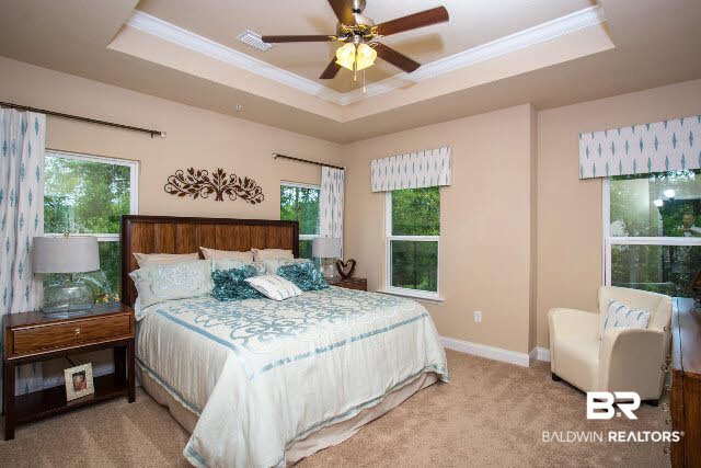 6903 Spaniel Drive, Unit 9C Daphne, AL 36527 - Photo 7 of 14 It's spacious! That's a king sized bed.