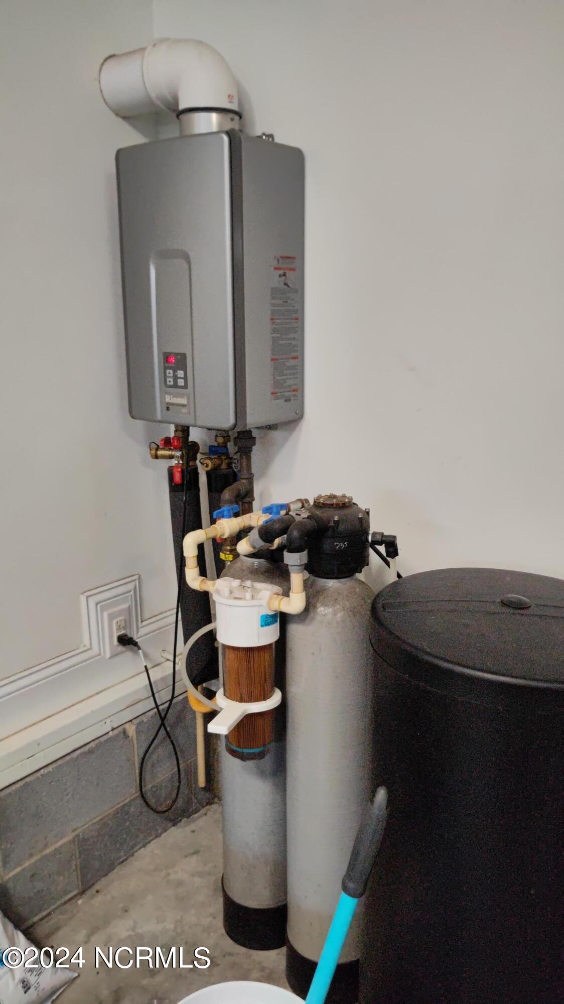 114 Ransey Court Hampstead, NC 28443 - Photo 39 of 48 Gas Tankless Water Heater. Whole House Water Softener.