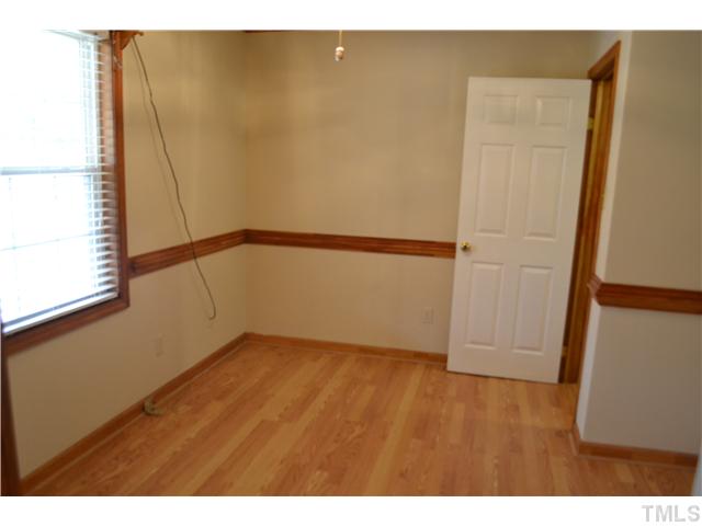505 Solar Drive Raleigh, NC 27610 - Photo 11 of 16 a view of empty room with wooden floor