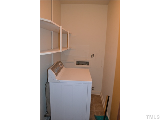 505 Solar Drive Raleigh, NC 27610 - Photo 14 of 16 a utility room with dryer and washer