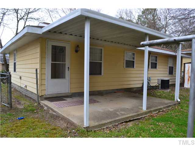 505 Solar Drive Raleigh, NC 27610 - Photo 15 of 16 a view of a house with backyard