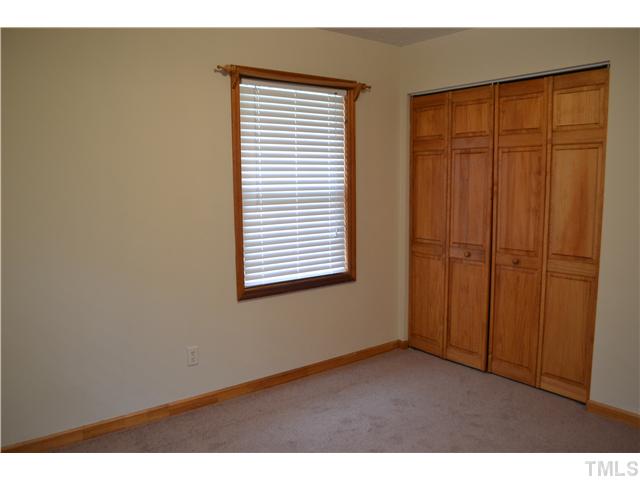505 Solar Drive Raleigh, NC 27610 - Photo 9 of 16 a view of an empty room with a window