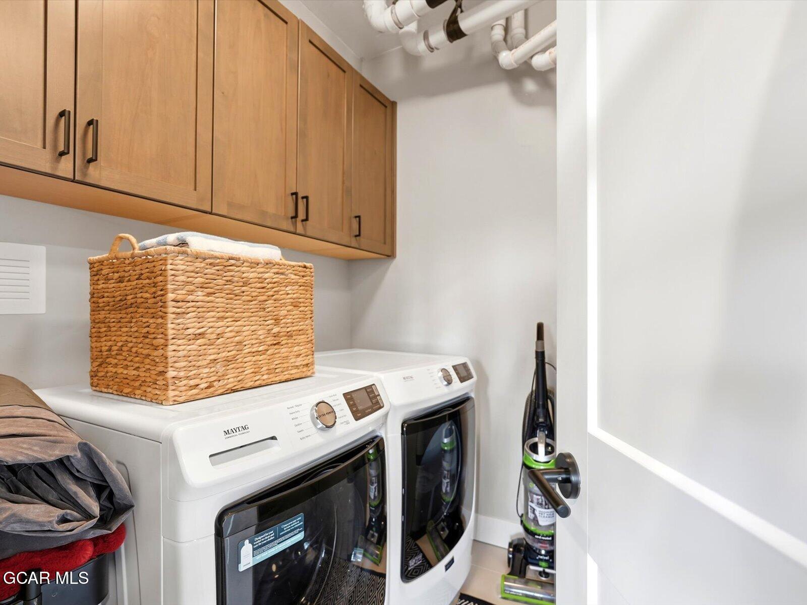 95 River Run Circle Fraser, CO 80442 - Photo 62 of 66 a utility room with dryer and washer