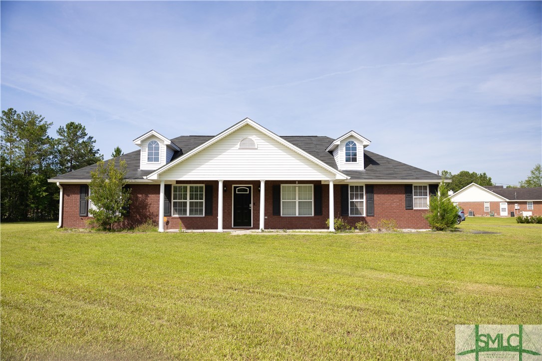306 Main Trail Midway, GA 31320 - Photo 1 of 36 Front of home