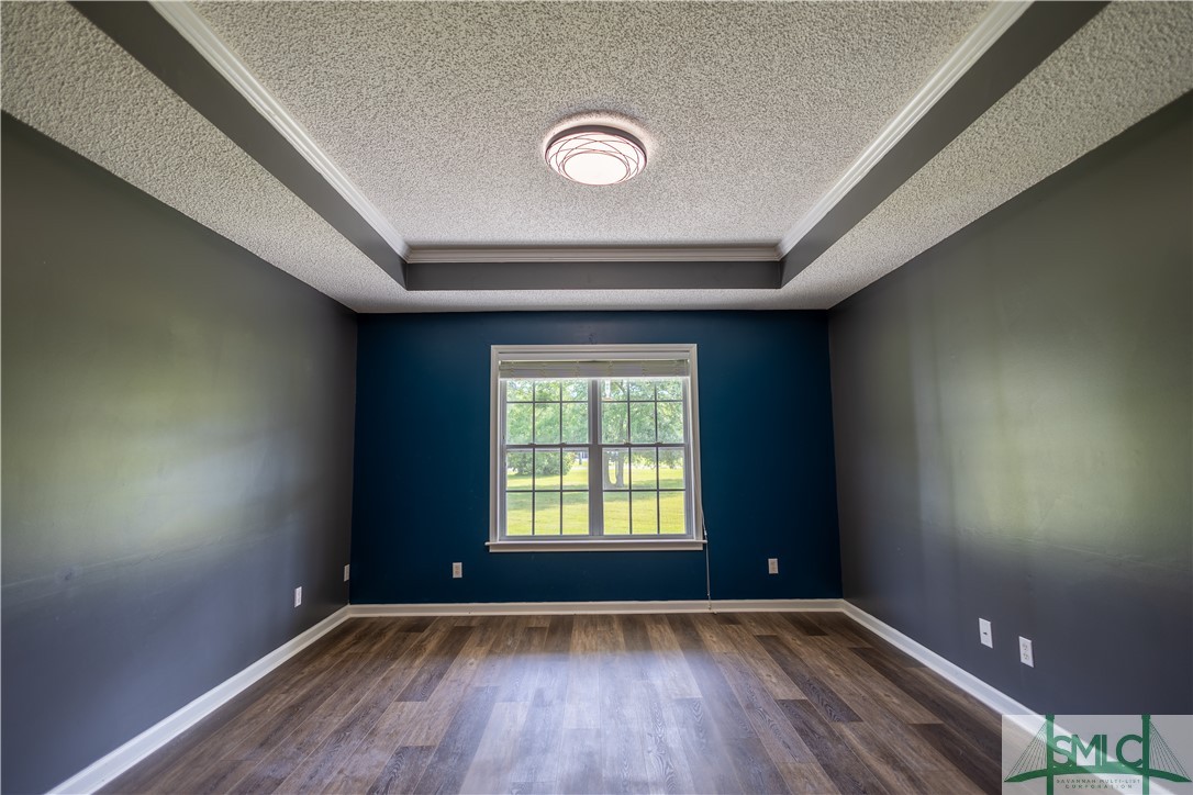 306 Main Trail Midway, GA 31320 - Photo 4 of 36 Formal dining right side of entrance hallway