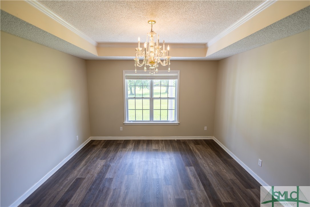 306 Main Trail Midway, GA 31320 - Photo 5 of 36 Formal dining left side of entrance hallway