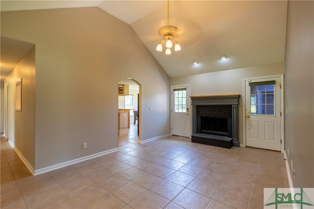 306 Main Trail Midway, GA 31320 - Photo 6 of 36 Living room with fireplace