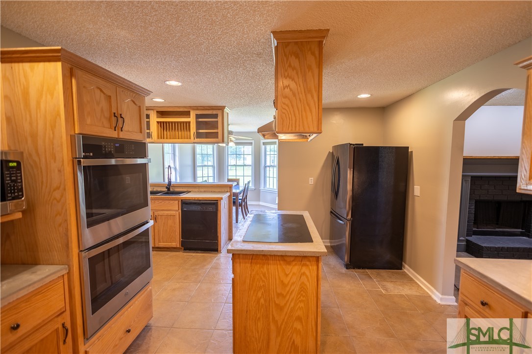 306 Main Trail Midway, GA 31320 - Photo 9 of 36 Kitchen with new countertops, paint, double oven,