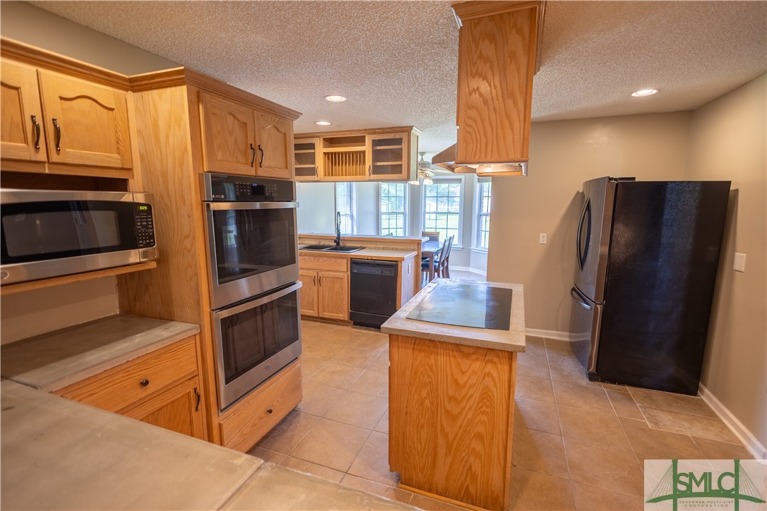 306 Main Trail Midway, GA 31320 - Photo 10 of 36 Kitchen with new countertops, paint, double oven,