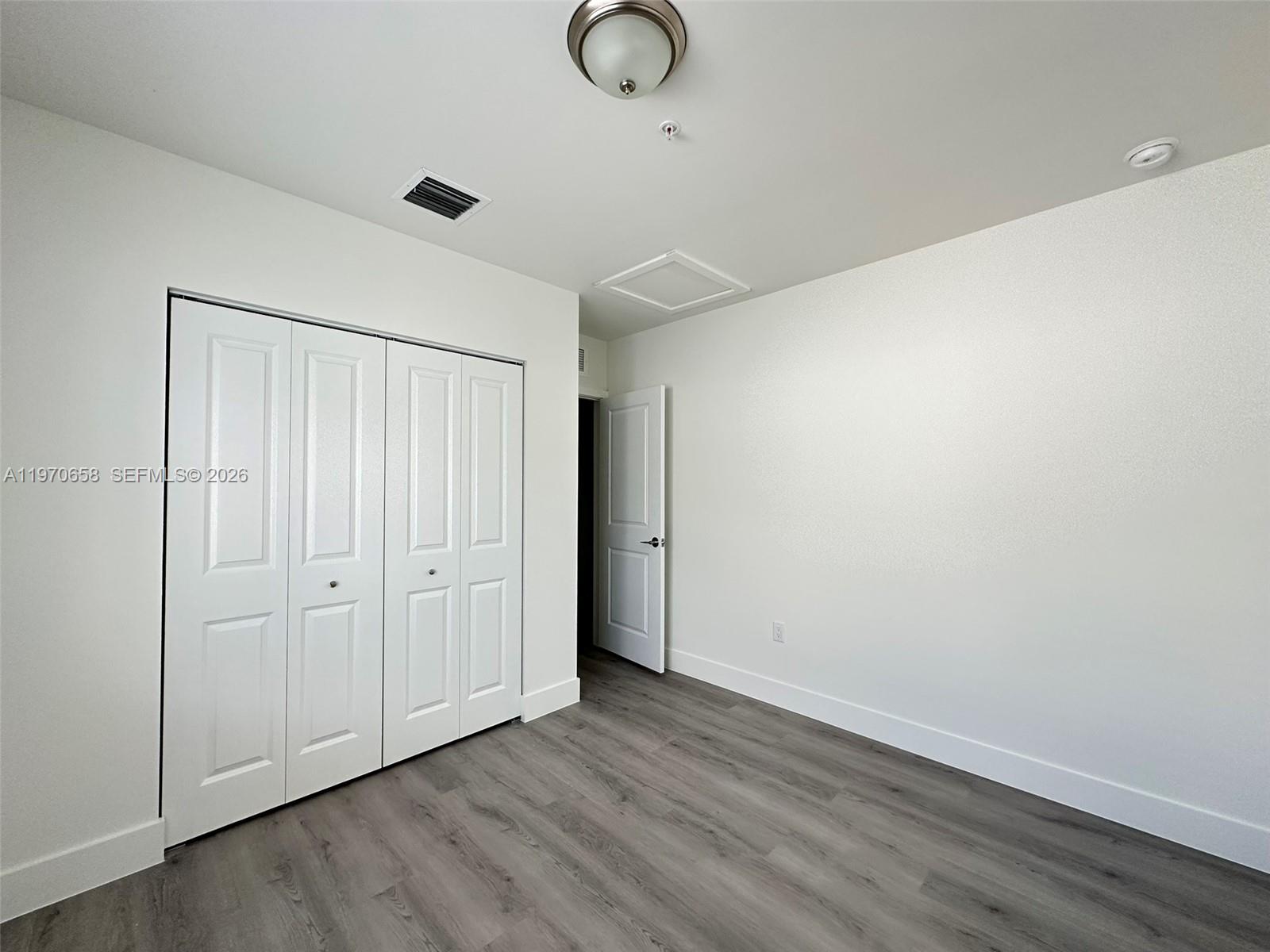11278 Southwest 187th Street, Unit 11278 Miami, FL 33157 - Photo 8 of 16 a view of entryway with wooden floor