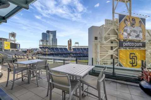 a view of a chairs and table in a patio