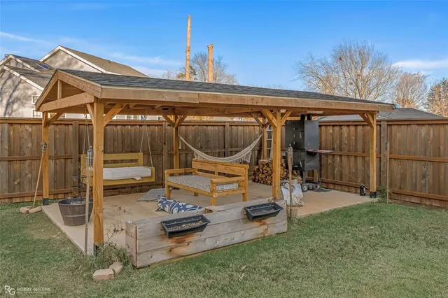 a view of a backyard with a garden