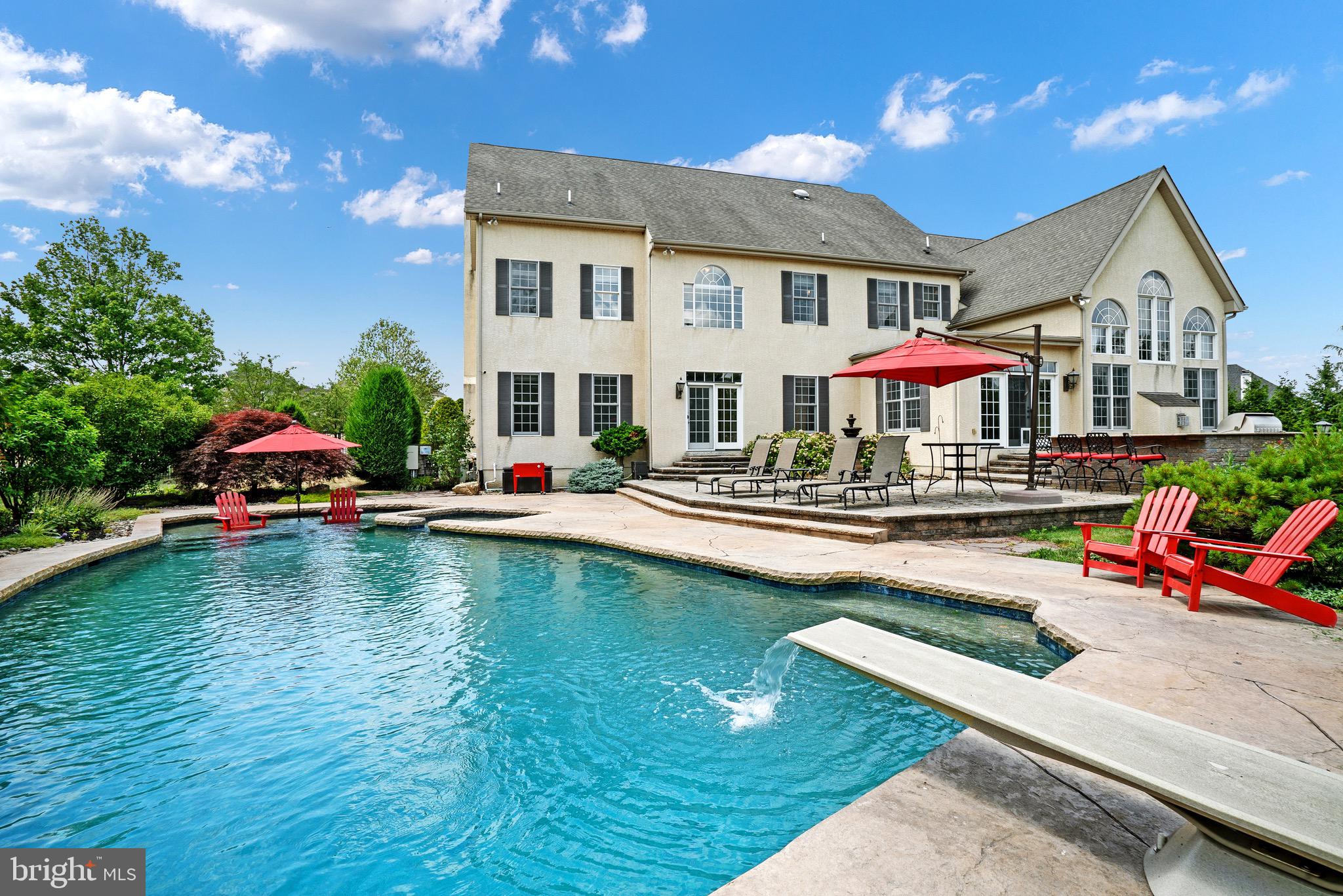 2221 Devin Lane Jamison, PA 18929 - Photo 4 of 12 a view of a house with swimming pool and sitting area