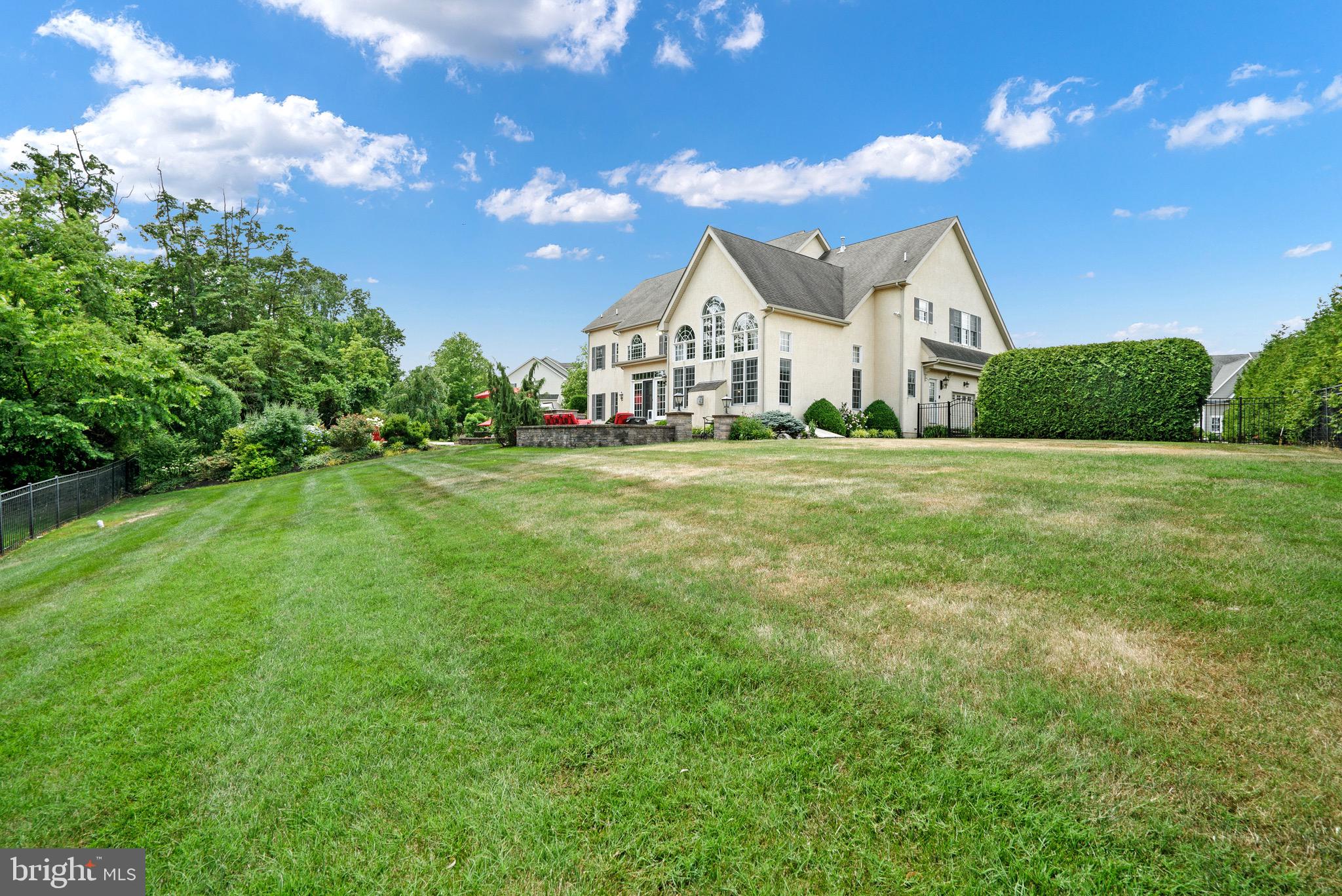 2221 Devin Lane Jamison, PA 18929 - Photo 9 of 12 a front view of a house with a yard