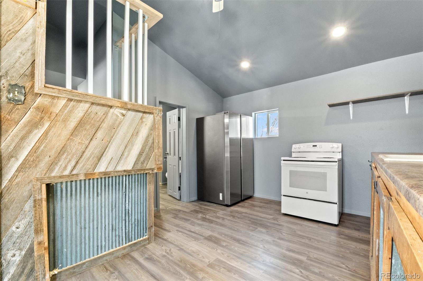 620 Hospital Road Brush, CO 80723 - Photo 12 of 24 a view of a hallway with washer and dryer