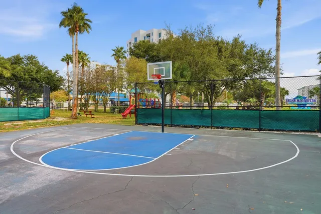 a view of a park with swings and slides