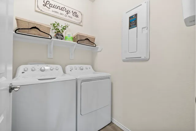 a utility room with dryer and washer