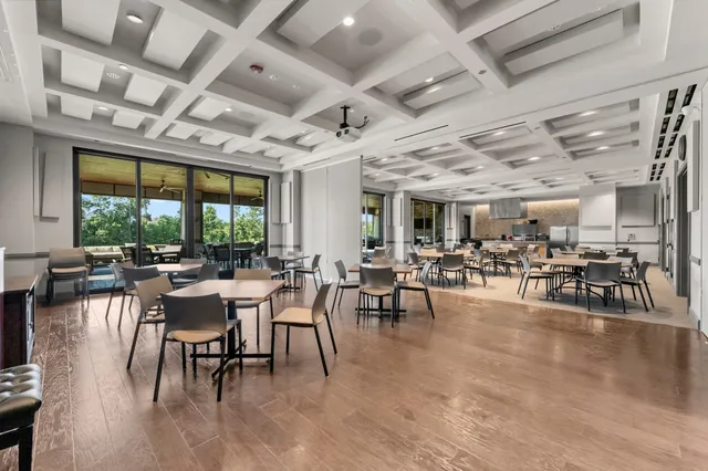 a view of a dining room with furniture window and outdoor view