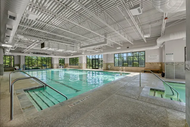 a view of a patio with a table and chairs