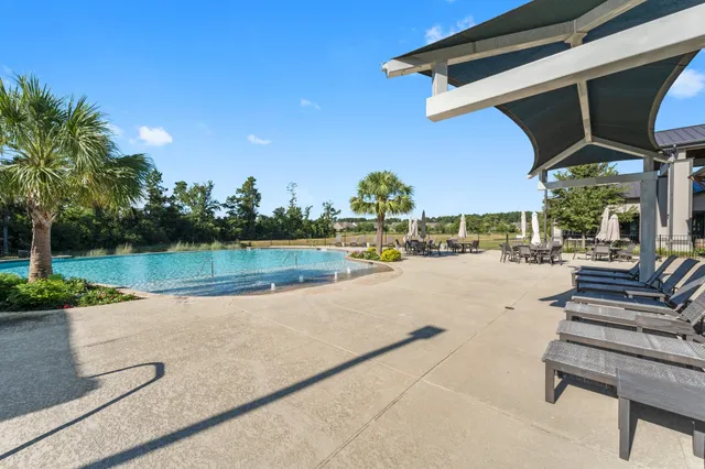 a view of a patio with a lake view