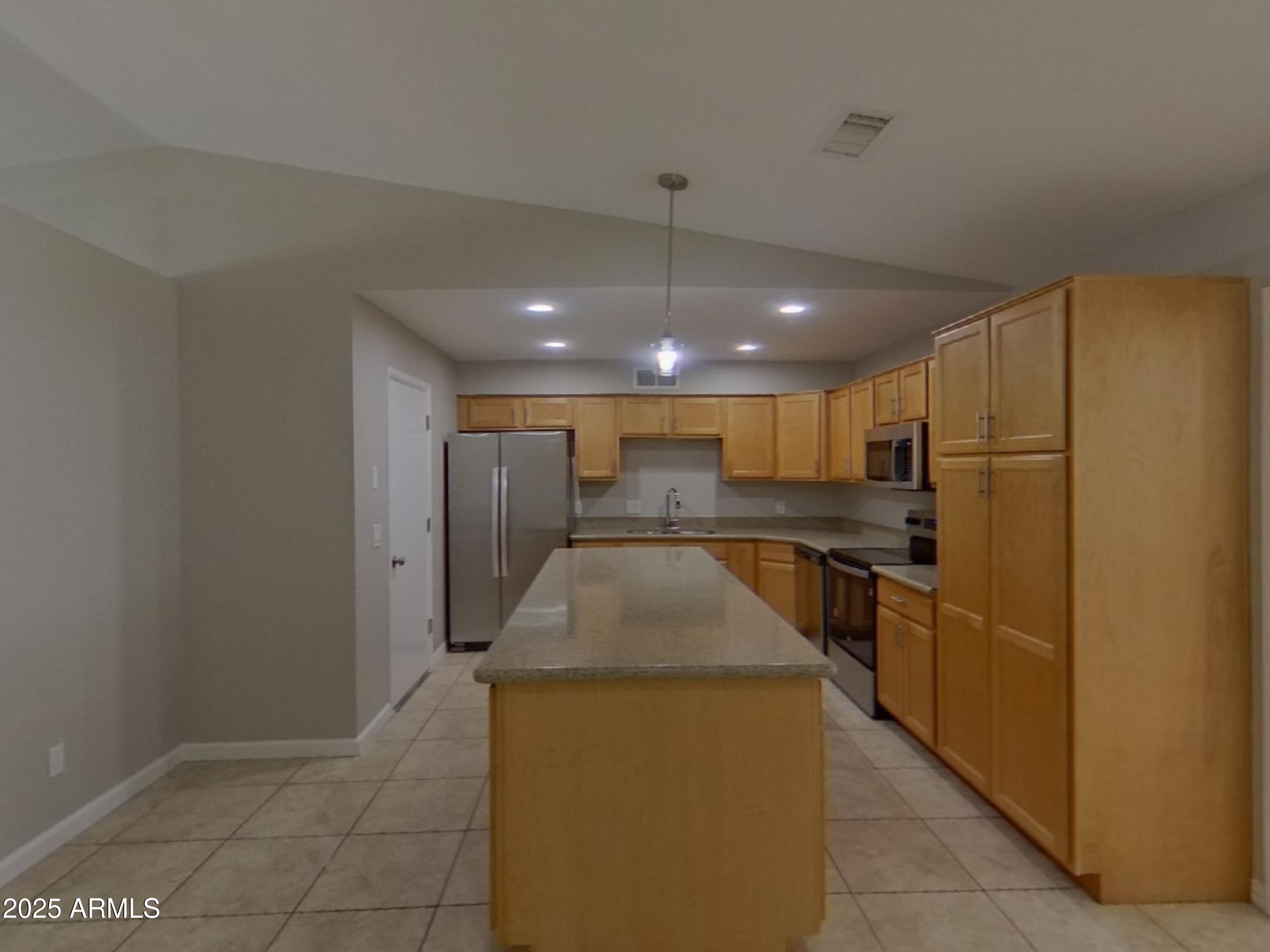 845 South Vineyard Mesa, AZ 85210 - Photo 8 of 26 a kitchen with stainless steel appliances granite countertop a refrigerator a oven and a sink with granite countertops